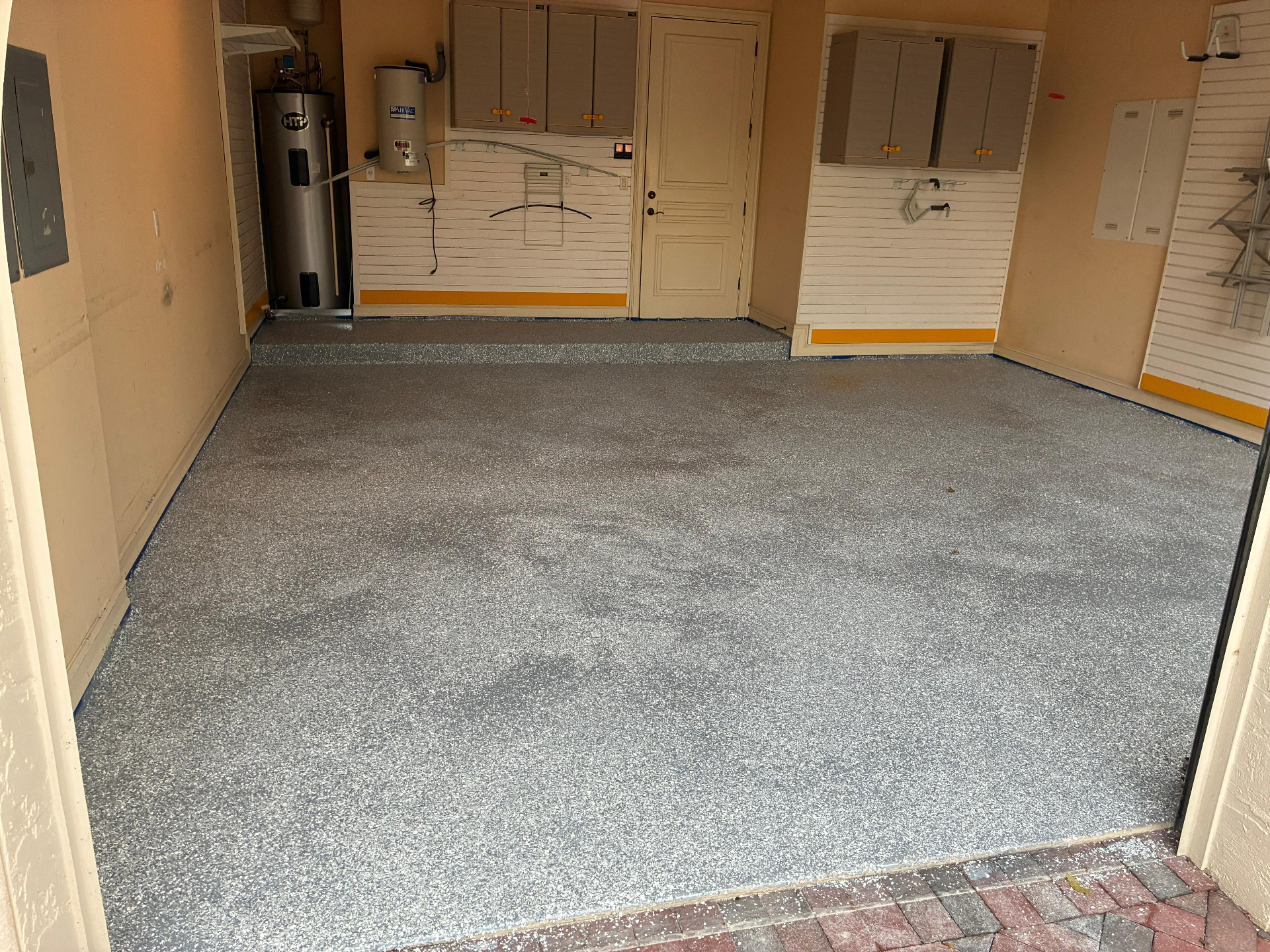 Epoxy garage floor with storage system