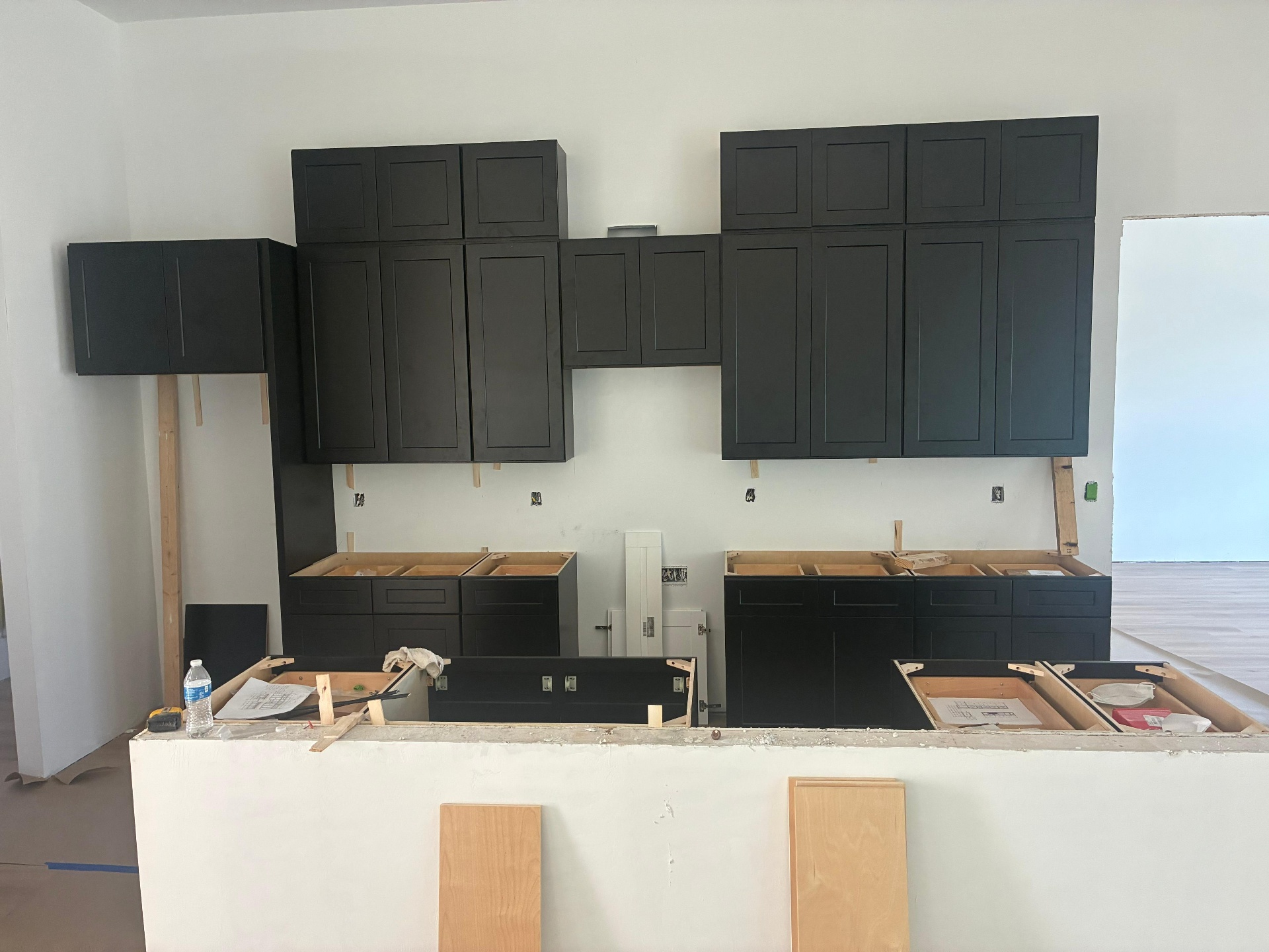 Custom dark cabinetry with island